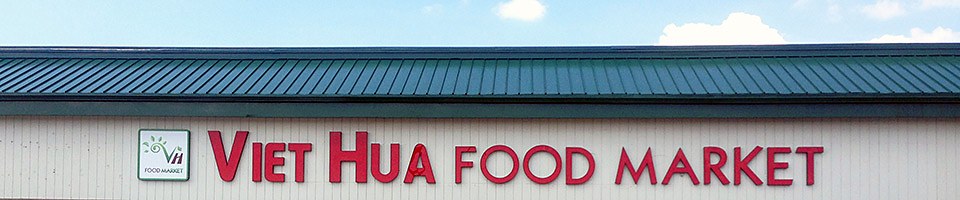 The Viet Hua Food Market sign on the storefront